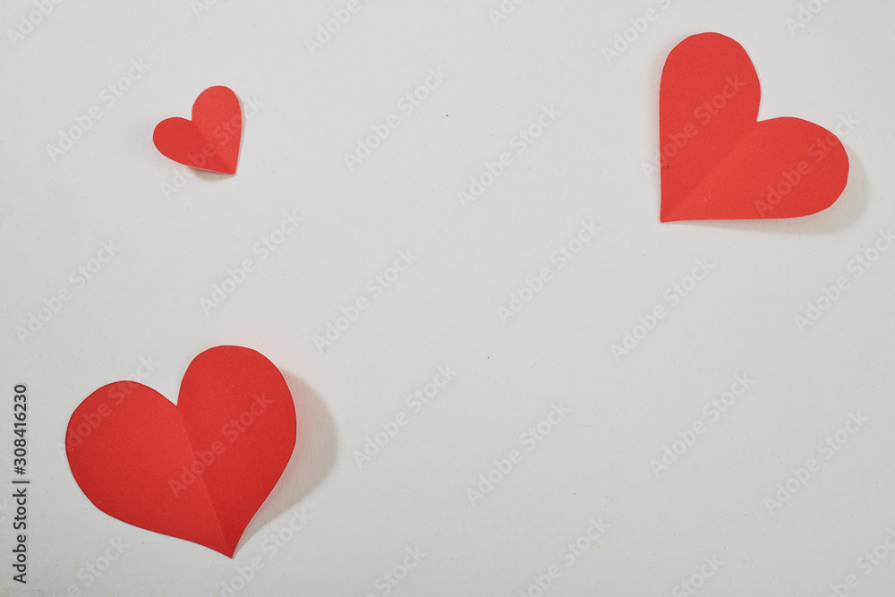 Red paper hearts isolated on white