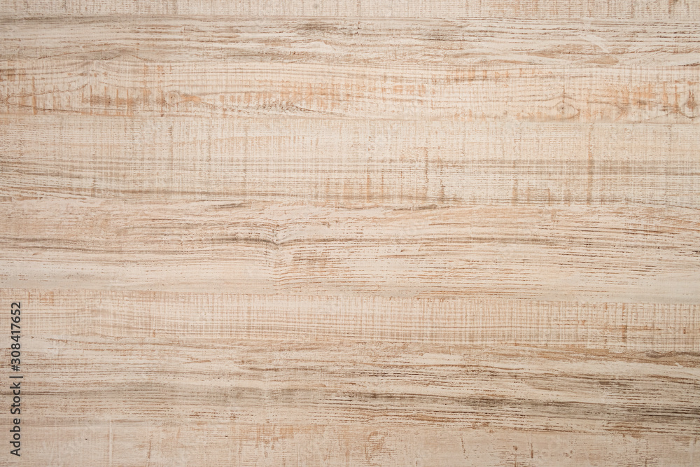Textured wooden plank of light color as background Textured wooden plank of light color as background