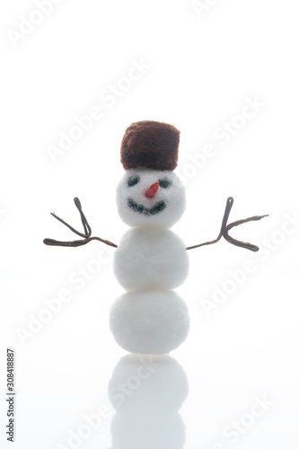 Vertical format of Christmas winter snowman on white background