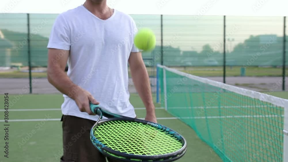 Tennis Racket Hitting a Tennis Ball in Slowmotion Stock Video Adobe Stock