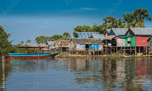 The Floating Villages of Tonlé Sap Lake Siem Reap, Cambodia,  living in a floating village surrounded by water and transportation only by boat