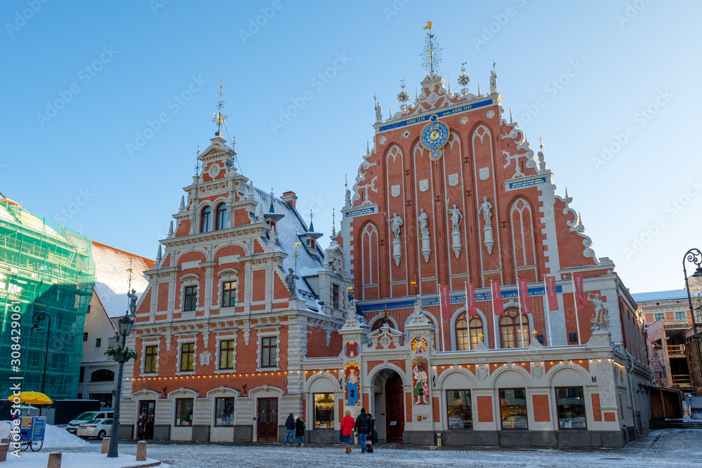 Riga / Latvia - 03 December 2019: House of the Blackheads on City Hall Square in Riga, Latvia. Winter sunny day, Christmas, holidays.