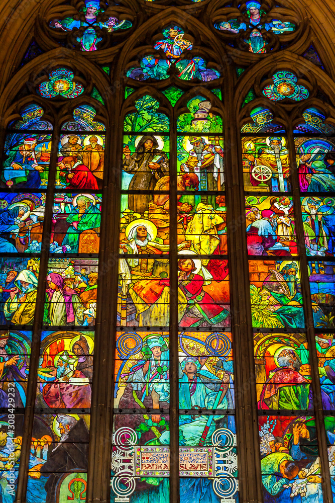 Prague, Prague / Czech Republic: Stained glass window by Alfons Mucha, located inside the Cathedral of St Vitus.