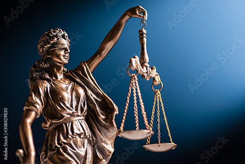 Bronze figurine of Lady Justice with her scales photo