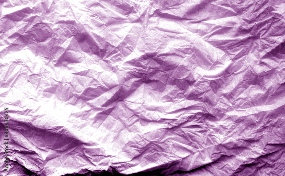 Crumpled sheet of paper with blur effect in purple tone. Crumpled sheet of paper with blur effect in purple tone.