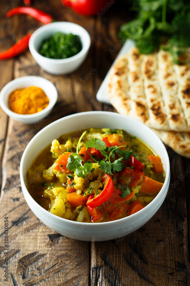 Homemade vegetable curry in a white bowl Homemade vegetable curry in a white bowl