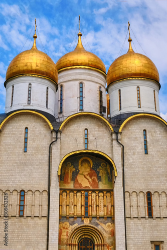 Southern portal of the Assumption Cathedral of the Kremlin. According to legend, in the 12th century Vladimir Monomakh brought the copper double-wing gate from Korsun - Moscow, Russia in June 2019 photo