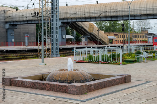 BOLOGOYE, RUSSIA - AUGUST 8, 2019: Fountain near the building of the railway station in the city of Bologoe. Tver region, Russia