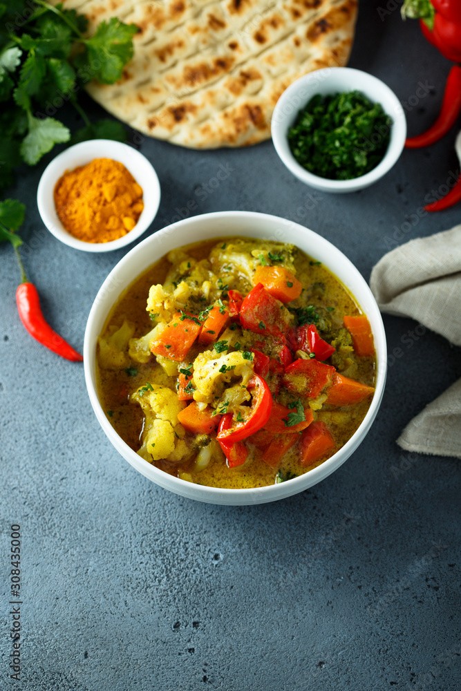 Homemade vegetable curry in a white bowl Homemade vegetable curry in a white bowl