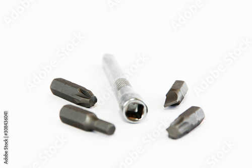 metal old nozzles and screwdriver for repair and installation