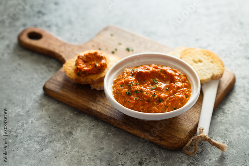Roasted pepper dip with white bread photo