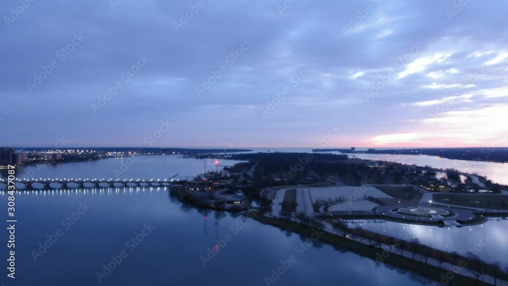 USA Michigan Detroit DJI Mavic flying over Detroit River / Downtown Detroit / Windsor on a dark, cold, winter, morning at Sunrise USA Michigan Detroit DJI Mavic flying over Detroit River / Downtown Detroit / Windsor on a dark, cold, winter, morning at Sunrise