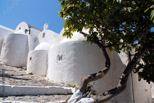 Greece, the beautiful island of Astypalaia. Three traditional old chapels on a hill in the island's old town, the chora.  photo