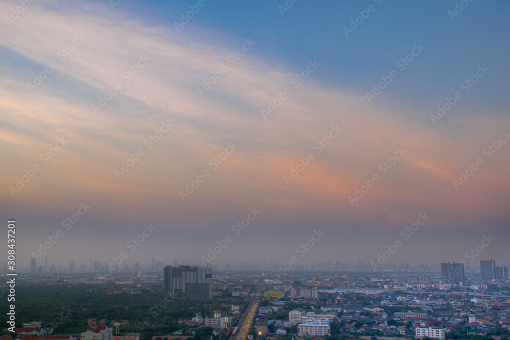 Aerial view of wonderful twilight sky during the sun going down in the dusk alongside Choa playa river which is the important river that be like the spinal cord of Thailand. with P.M.2.5 pollution
