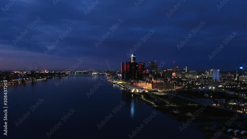 USA Michigan Detroit DJI Mavic flying over Detroit River / Downtown Detroit / Windsor on a dark, cold, winter, morning at Sunrise USA Michigan Detroit DJI Mavic flying over Detroit River / Downtown Detroit / Windsor on a dark, cold, winter, morning at Sunrise