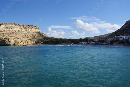  A view of the bay of the southern Cretan village of Matala  which used to be the port of Ancient Phaistos during Minoan and Roman times.  Today it is a tranquil sea side resort. 