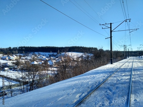 railroad tracks in the snow