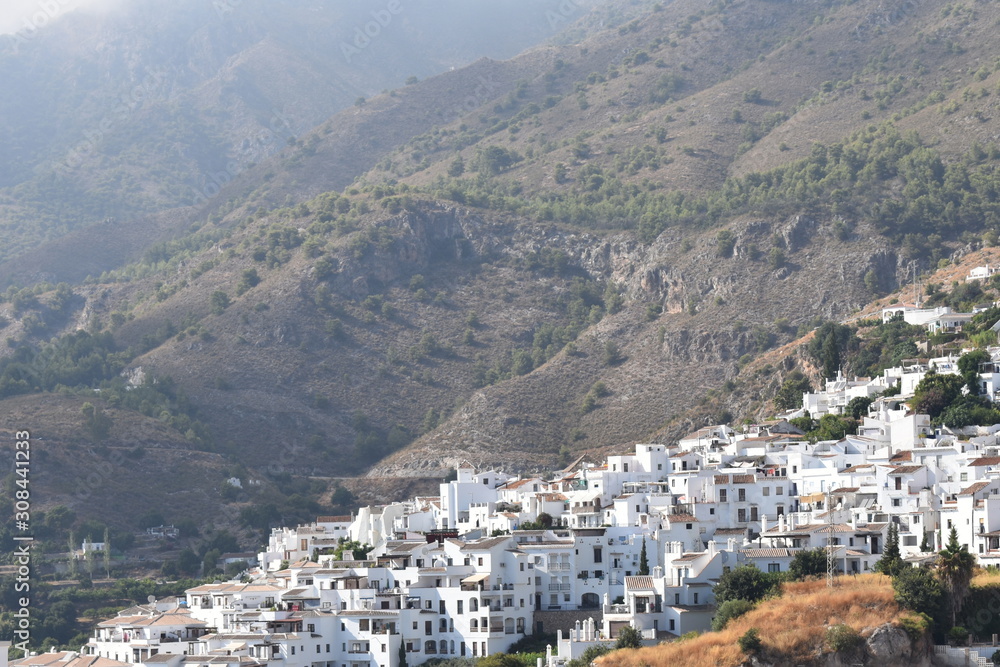 A view of the pretty Spanish village of Frigiliana.  Surrounded by high mountains the village is dramatically located.