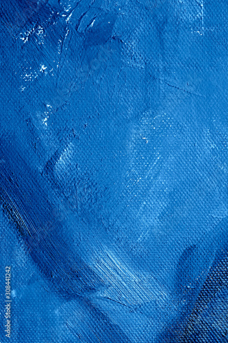 Canvas with oil paints blue colors. Bright saturated abstract background, copy space. The concept of a creative atmosphere, artistic events, education, etc.