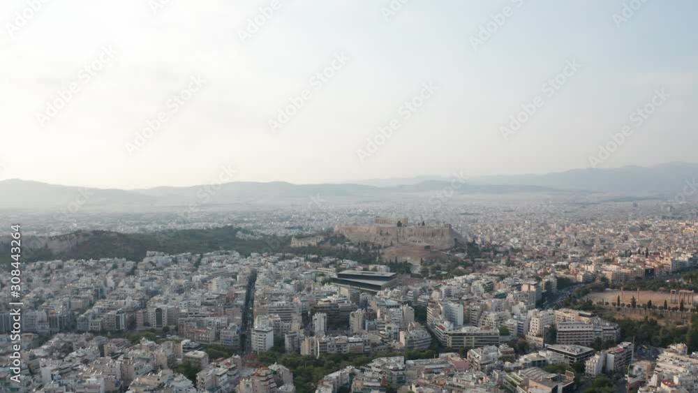 Aerial view of the Acropolis, Athens, Greece. Wide shot dolly back. Aerial view of the Acropolis, Athens, Greece. Wide shot dolly back.