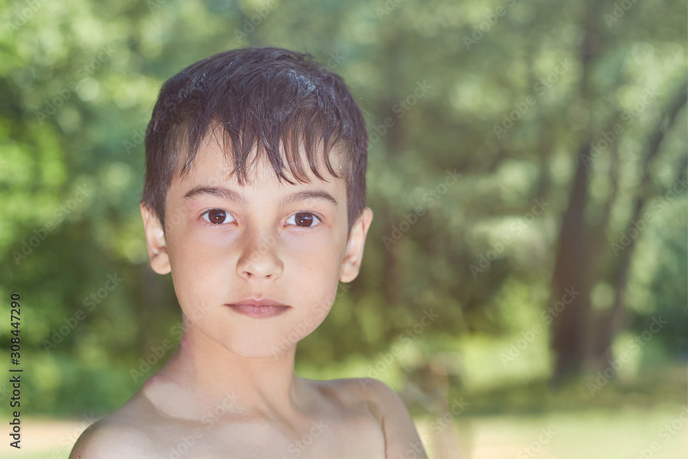Portrait of young boy in nature, park or outdoors Portrait of young boy in nature, park or outdoors