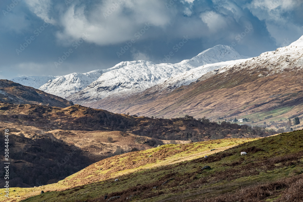 First snow in Scottish Highlands, view walking up Meall Ghaordaidh from Glen Lochay.