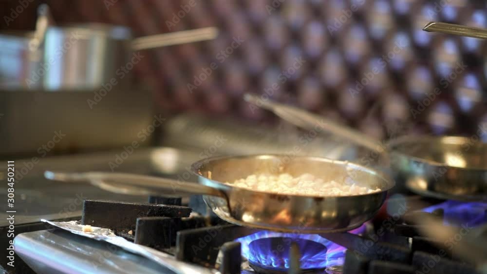 FHD Video of cooking vegetables on a frying pan FHD Video of cooking vegetables on a frying pan
