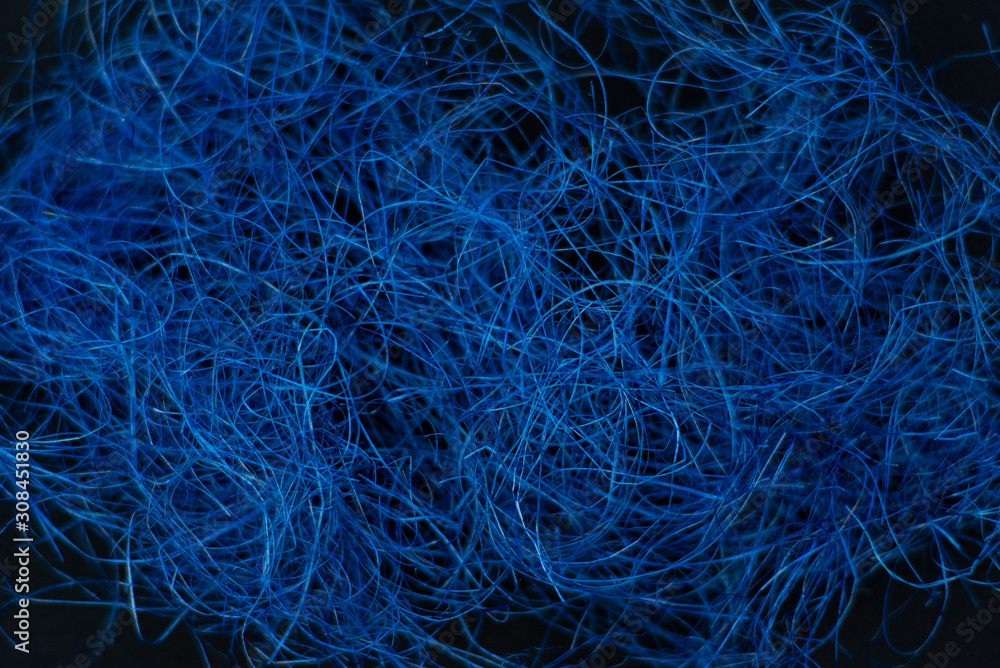 Obraz premium Blue classic color. 2020 color. .fiber on a black background. Background, structure.