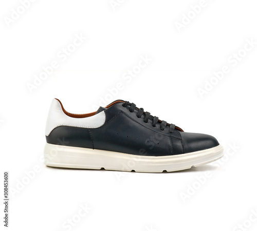 black and white men's athletic shoes on a white background isolate side view.