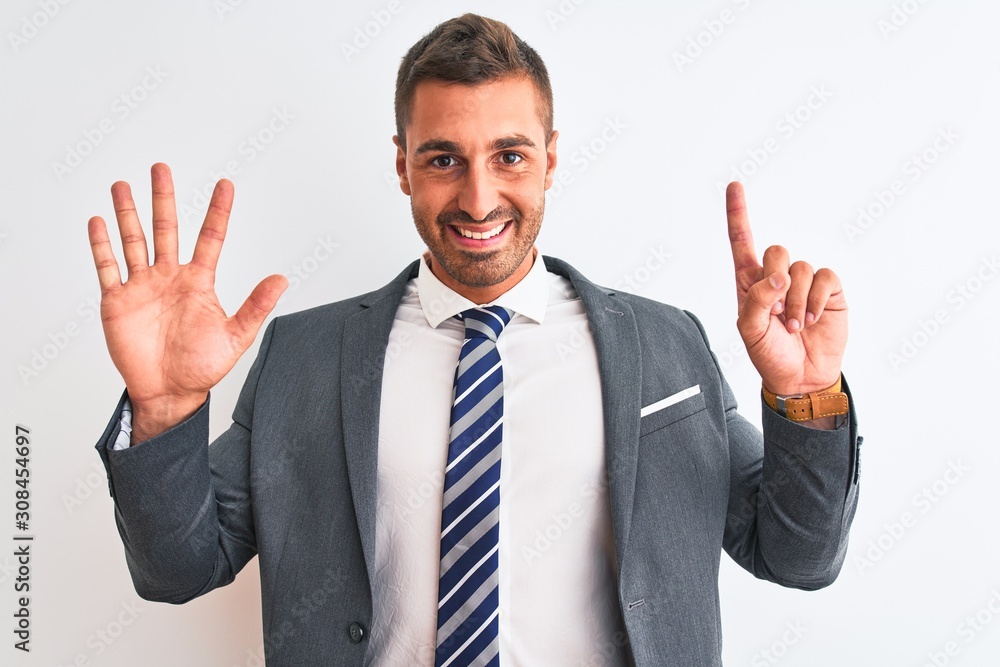 Young handsome business man wearing suit and tie over isolated background showing and pointing up with fingers number six while smiling confident and happy. Young handsome business man wearing suit and tie over isolated background showing and pointing up with fingers number six while smiling confident and happy.