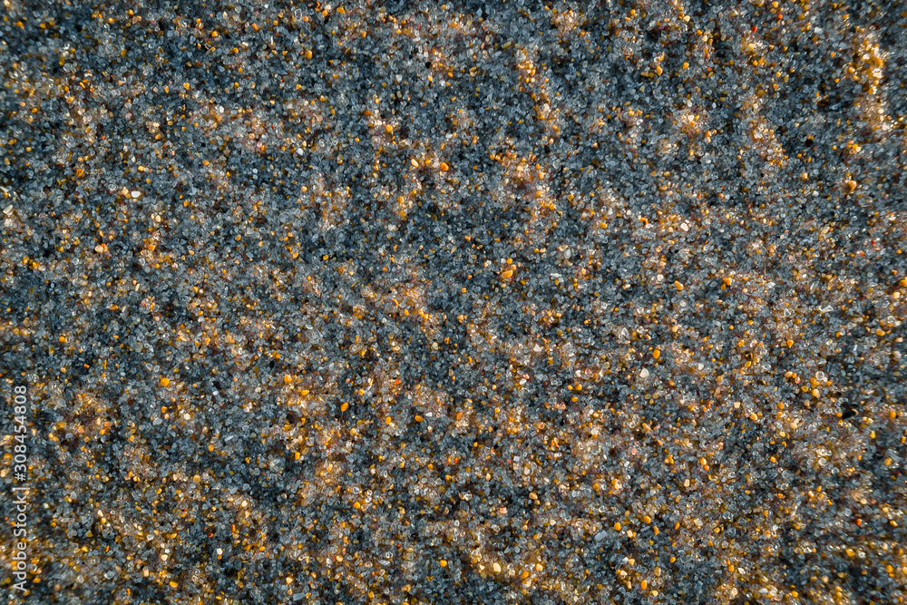 Macro of beach sand, to use as a natural background of rough pebbles. Macro of beach sand, to use as a natural background of rough pebbles.
