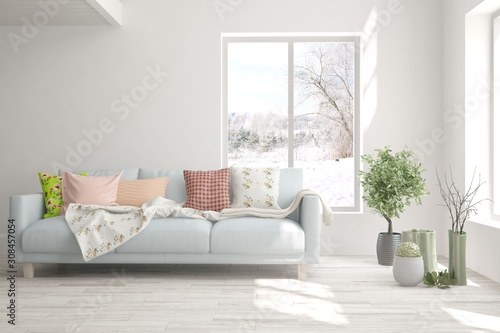 Stylish room in white color with sofa and winter landscape in window. Scandinavian interior design. 3D illustration