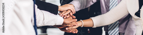 Fotografi Successful of group business people stack and putting their hands together at office