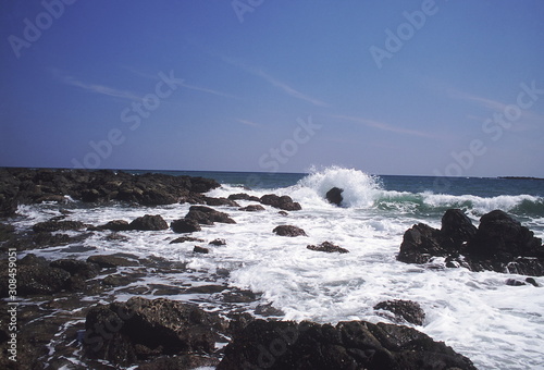 Waves crashing on the rocky shores. Andaman Islands.