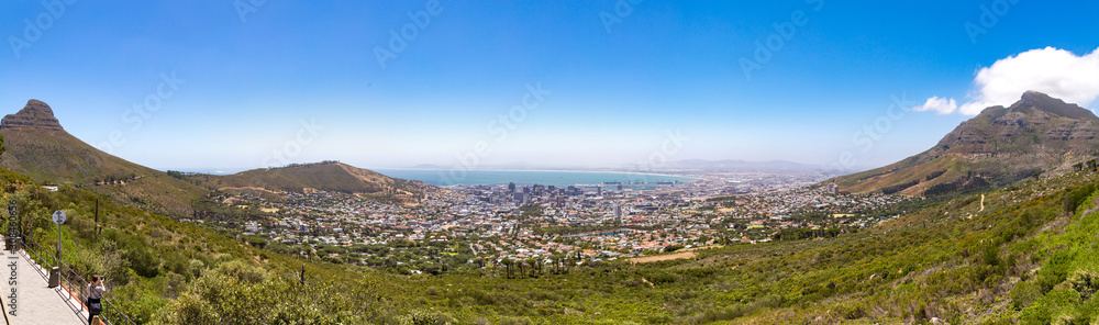 Panoramic view over Cape Town, Devil's Peak, Lion's Head and Signal Hill on a sunny day, South Africa