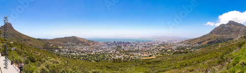 Panoramic view over Cape Town, Devil's Peak, Lion's Head and Signal Hill on a sunny day, South Africa