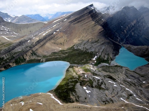 Views from a helicopter of the mountain lakes in Canada
