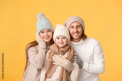 Happy family in winter clot...