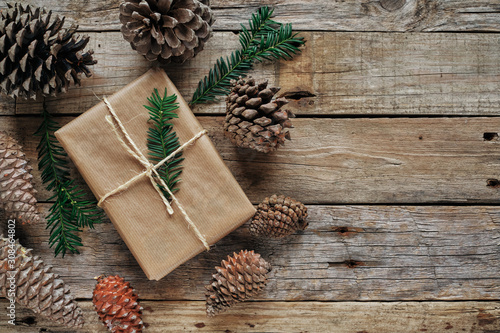 Gift package wrapped with kraft paper tied with a rope