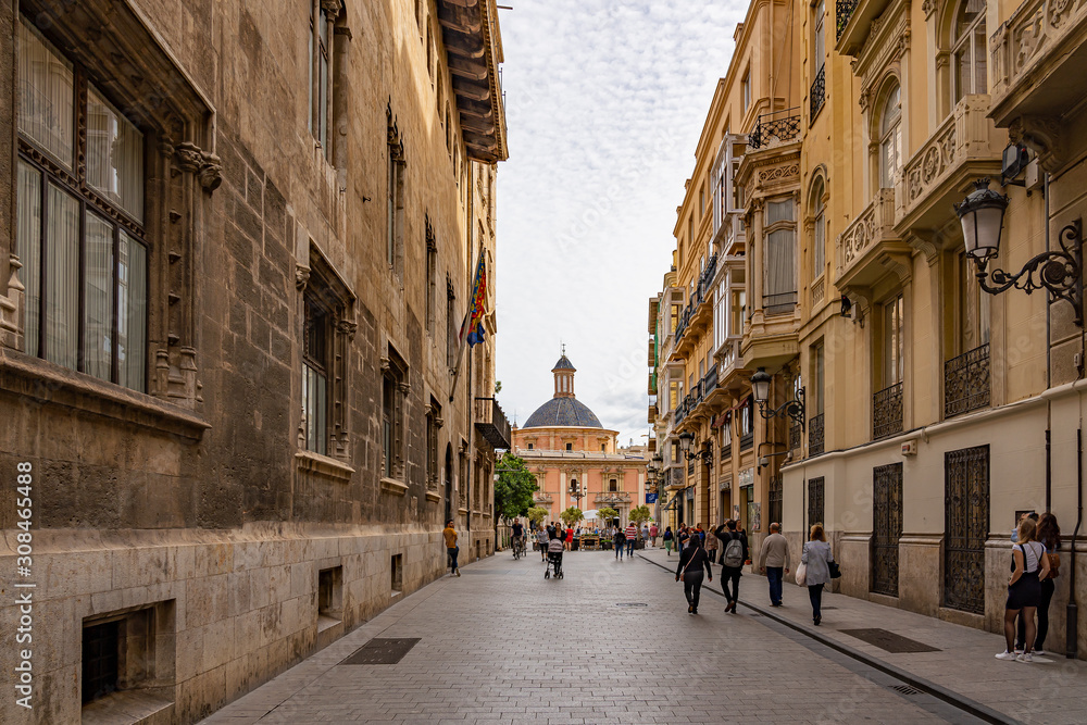 View from Carrer dels Cavallers on the Plaza de la Virgen in Valencia, Spain