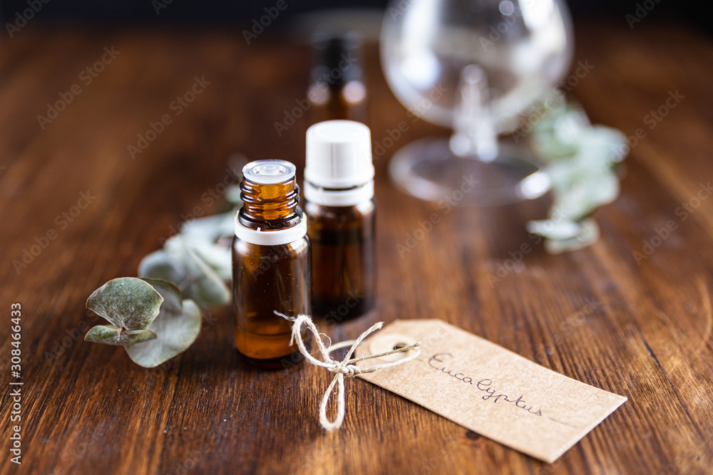 bottle of eucalyptus essential oil opened bottle of eucalyptus essential oil opened