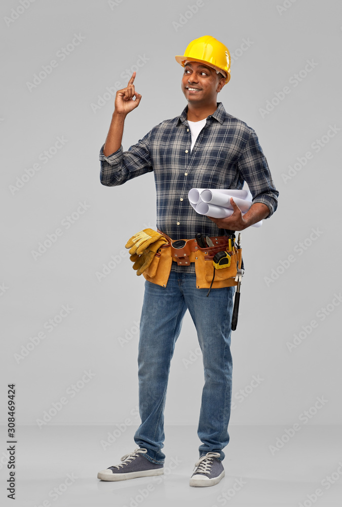 profession, construction and building - happy smiling indian worker or builder in helmet with tool belt having idea over grey background profession, construction and building - happy smiling indian worker or builder in helmet with tool belt having idea over grey background