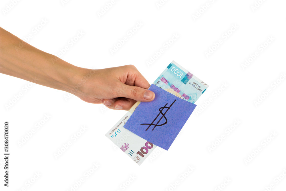 Thousand hryvnias and sticker with different financial signs and symbols in the hand, isolated Thousand hryvnias and sticker with different financial signs and symbols in the hand, isolated