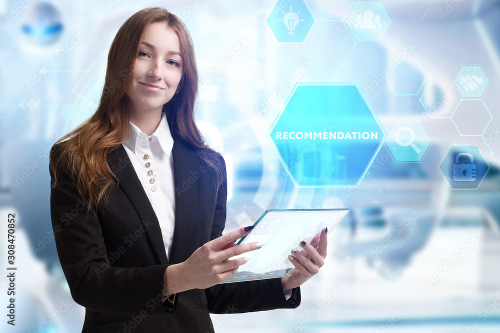 Business, Technology, Internet and network concept. Young businessman working on a virtual screen of the future and sees the inscription: Recommendation Business, Technology, Internet and network concept. Young businessman working on a virtual screen of the future and sees the inscription: Recommendation