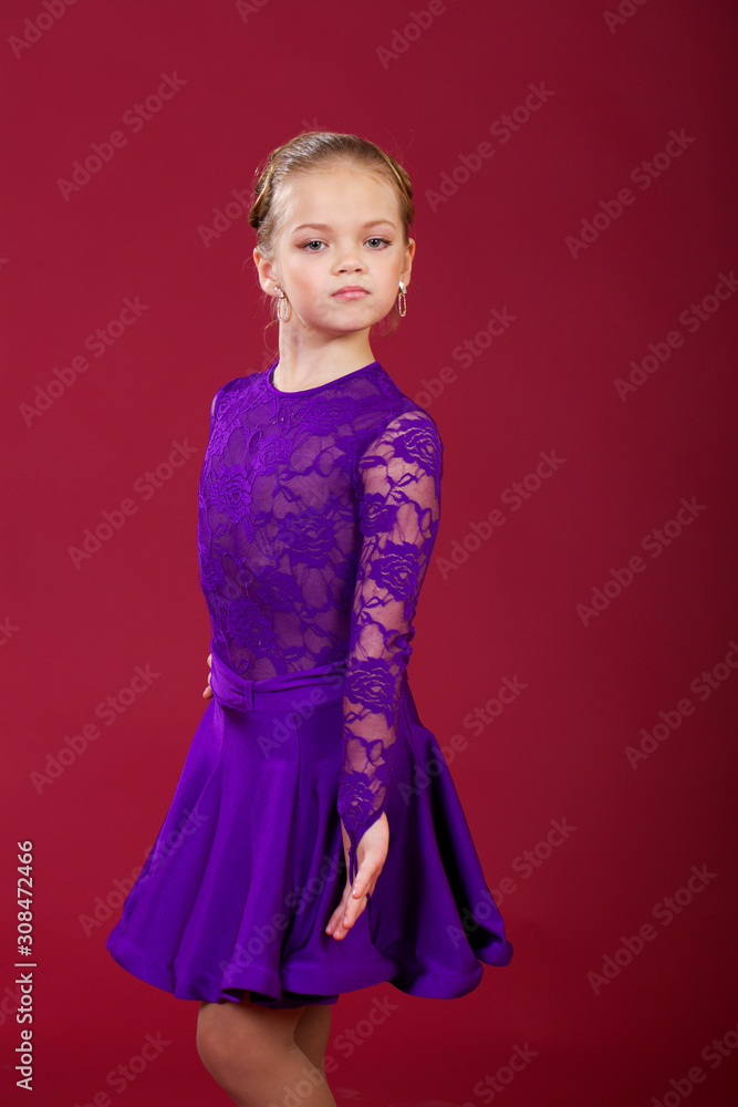 Portrait of a little girl in a purple dance dress Portrait of a little girl in a purple dance dress