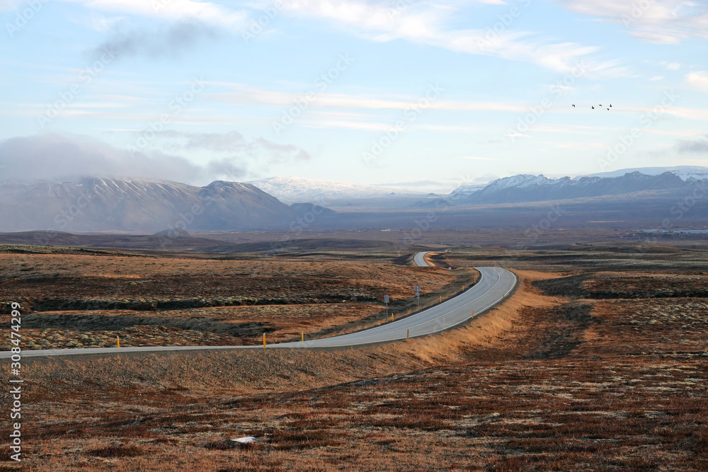 beautiful road across the Iceland going far