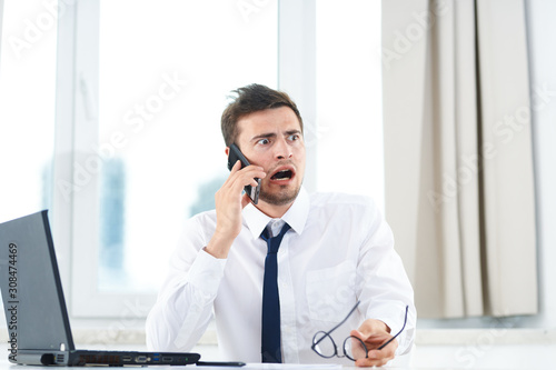 young businessman talking on phone