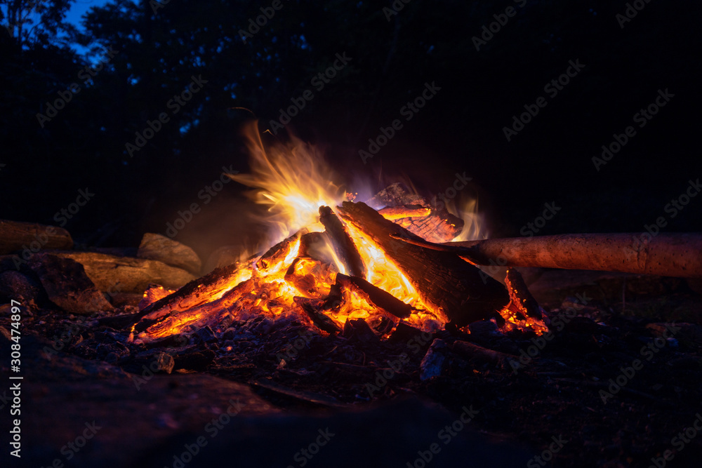 Fototapeta premium Blue and orange fire at night
