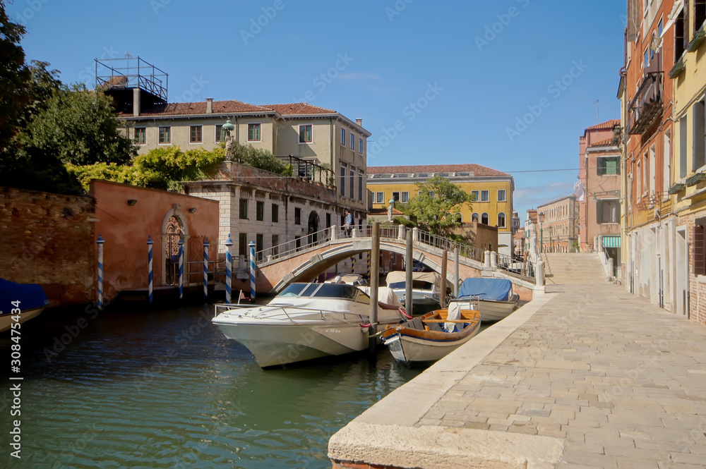 Moored boats on a canal in Venice