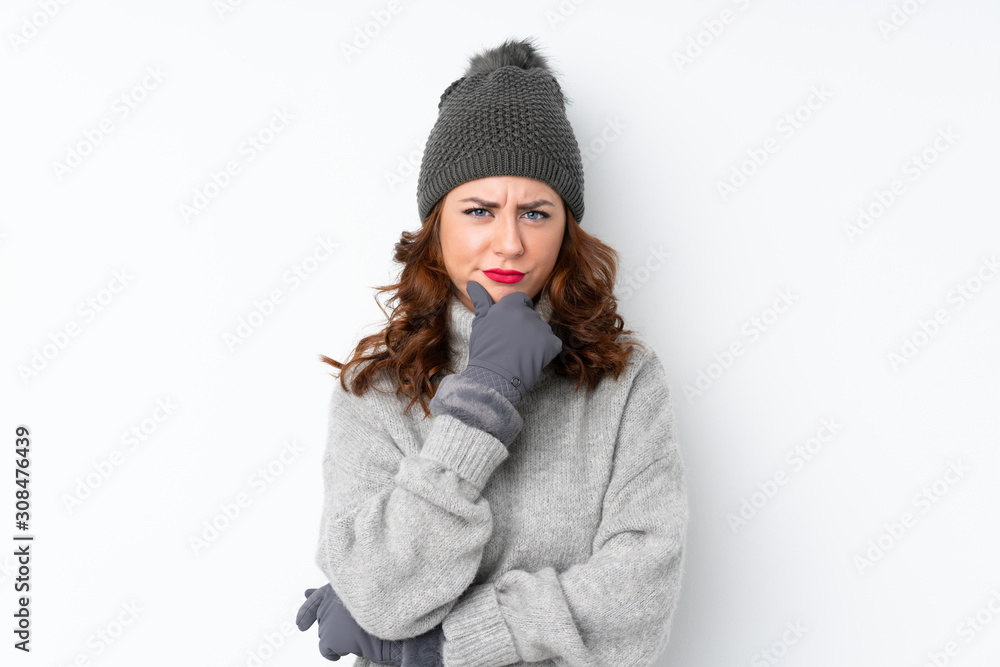 Young Russian woman with winter hat over isolated white background laughing Young Russian woman with winter hat over isolated white background laughing